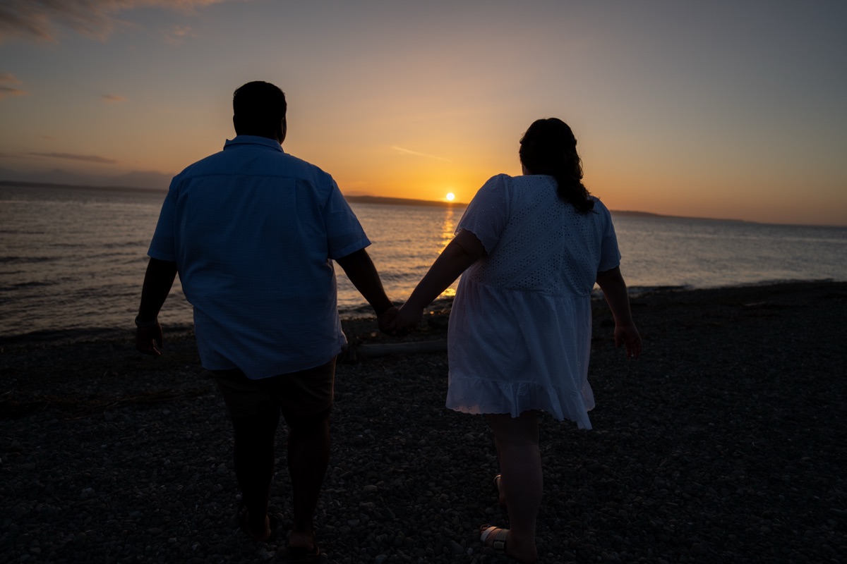 A sunset kiss by the water