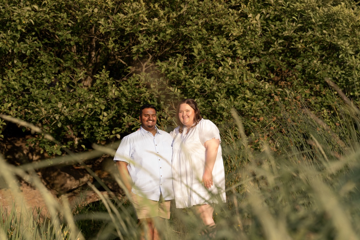 Adrian and Victoria in the tall grass